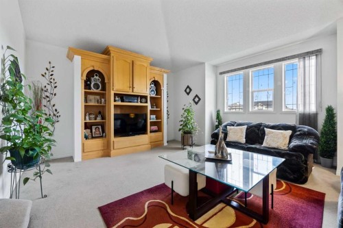 465 Panamount Boulevard Nw, Calgary, AB - Indoor Photo Showing Living Room