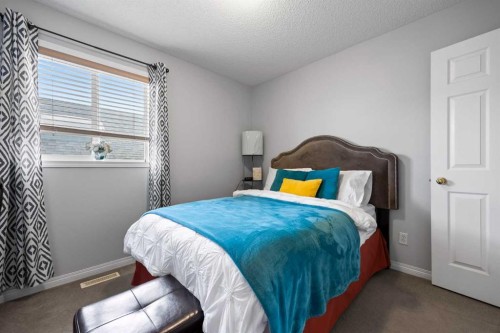 465 Panamount Boulevard Nw, Calgary, AB - Indoor Photo Showing Bedroom