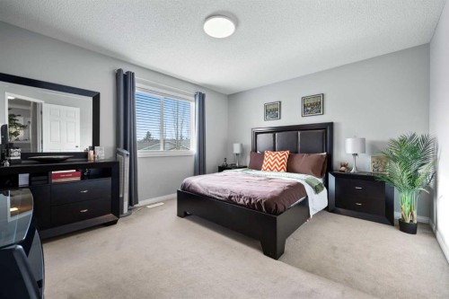 465 Panamount Boulevard Nw, Calgary, AB - Indoor Photo Showing Bedroom
