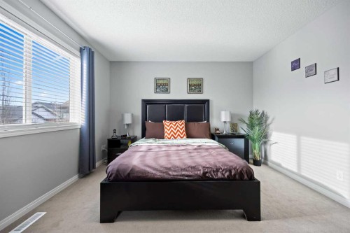 465 Panamount Boulevard Nw, Calgary, AB - Indoor Photo Showing Bedroom