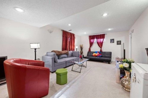 465 Panamount Boulevard Nw, Calgary, AB - Indoor Photo Showing Living Room