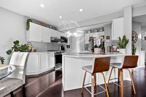 465 Panamount Boulevard Nw, Calgary, AB - Indoor Photo Showing Kitchen With Upgraded Kitchen