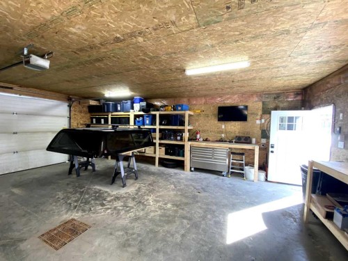 45 Lyons Close, Red Deer, AB - Indoor Photo Showing Garage