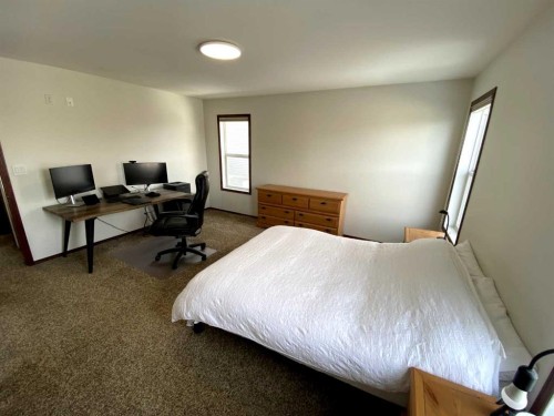 45 Lyons Close, Red Deer, AB - Indoor Photo Showing Bedroom