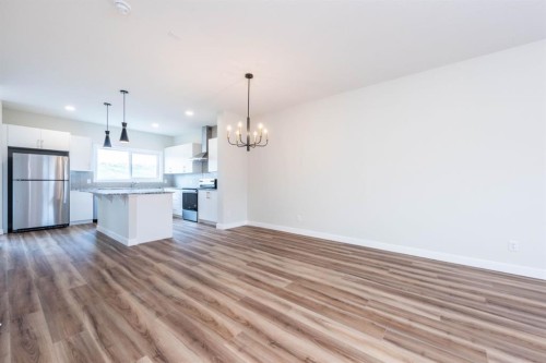 671 Wolf Willow Boulevard Se, Calgary, AB - Indoor Photo Showing Kitchen With Stainless Steel Kitchen With Upgraded Kitchen