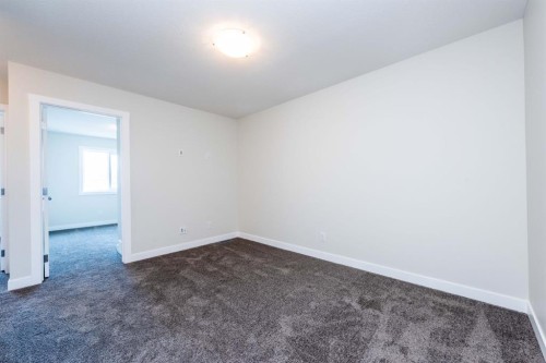 671 Wolf Willow Boulevard Se, Calgary, AB - Indoor Photo Showing Other Room