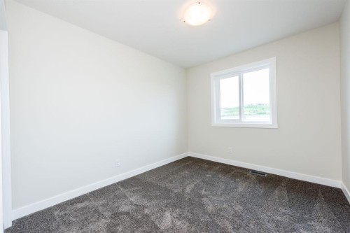 671 Wolf Willow Boulevard Se, Calgary, AB - Indoor Photo Showing Other Room