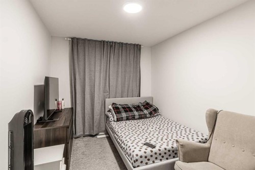 854 Cobblefield Manor Sw, Airdrie, AB - Indoor Photo Showing Bedroom