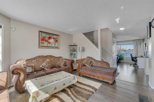 92 Taradale Drive Ne, Calgary, AB - Indoor Photo Showing Living Room
