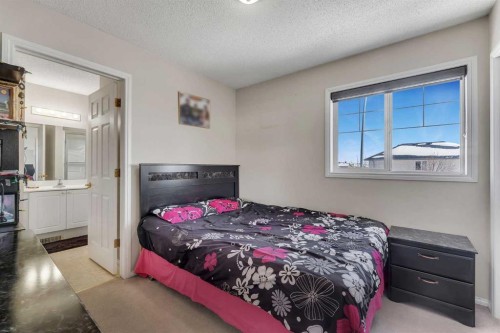 92 Taradale Drive Ne, Calgary, AB - Indoor Photo Showing Bedroom