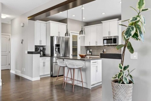 9 Legacy Lane Se, Calgary, AB - Indoor Photo Showing Kitchen With Stainless Steel Kitchen With Upgraded Kitchen
