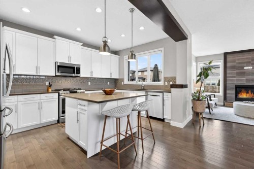 9 Legacy Lane Se, Calgary, AB - Indoor Photo Showing Kitchen With Stainless Steel Kitchen With Upgraded Kitchen
