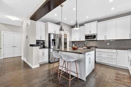 9 Legacy Lane Se, Calgary, AB - Indoor Photo Showing Kitchen With Stainless Steel Kitchen With Upgraded Kitchen