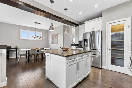 9 Legacy Lane Se, Calgary, AB - Indoor Photo Showing Kitchen With Stainless Steel Kitchen With Upgraded Kitchen