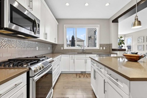 9 Legacy Lane Se, Calgary, AB - Indoor Photo Showing Kitchen With Upgraded Kitchen
