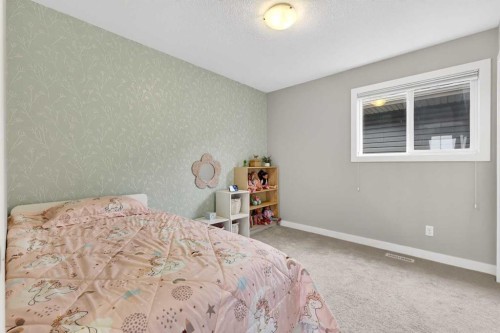 9 Legacy Lane Se, Calgary, AB - Indoor Photo Showing Bedroom