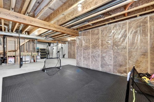 9 Legacy Lane Se, Calgary, AB - Indoor Photo Showing Basement