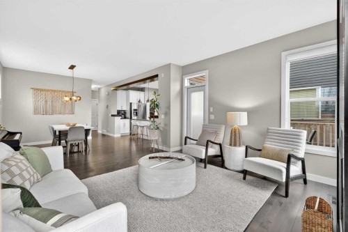 9 Legacy Lane Se, Calgary, AB - Indoor Photo Showing Living Room