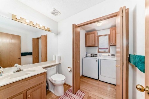 223 Hawkstone Close Nw, Calgary, AB - Indoor Photo Showing Laundry Room