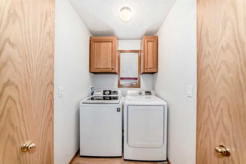223 Hawkstone Close Nw, Calgary, AB - Indoor Photo Showing Laundry Room