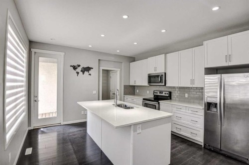 195 Masters Avenue Se, Calgary, AB - Indoor Photo Showing Kitchen With Stainless Steel Kitchen With Upgraded Kitchen