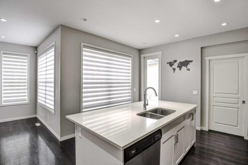195 Masters Avenue Se, Calgary, AB - Indoor Photo Showing Kitchen With Double Sink