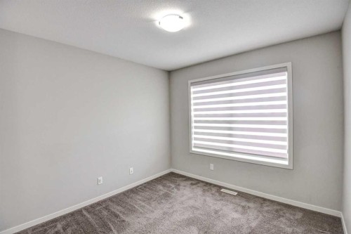 195 Masters Avenue Se, Calgary, AB - Indoor Photo Showing Other Room
