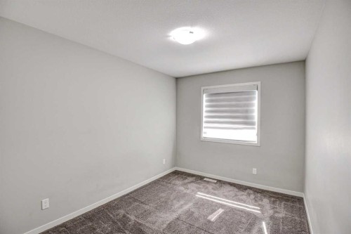 195 Masters Avenue Se, Calgary, AB - Indoor Photo Showing Other Room
