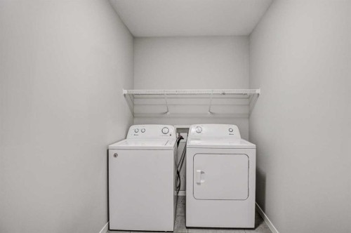 195 Masters Avenue Se, Calgary, AB - Indoor Photo Showing Laundry Room