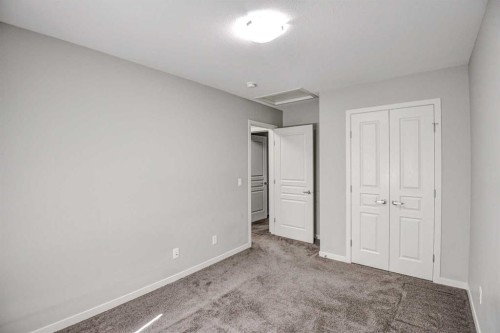 195 Masters Avenue Se, Calgary, AB - Indoor Photo Showing Other Room