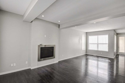 195 Masters Avenue Se, Calgary, AB - Indoor With Fireplace