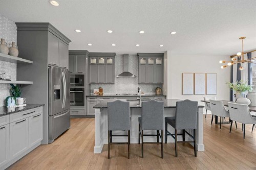 225 West Grove Way Sw, Calgary, AB - Indoor Photo Showing Kitchen With Upgraded Kitchen