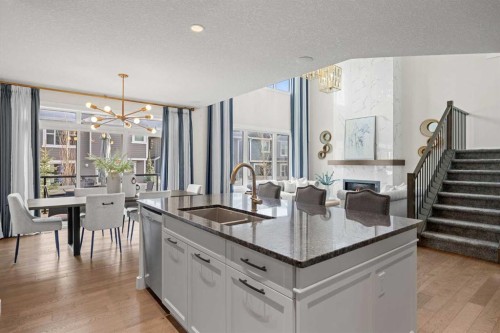 225 West Grove Way Sw, Calgary, AB - Indoor Photo Showing Kitchen With Double Sink With Upgraded Kitchen