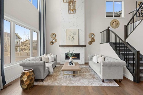 225 West Grove Way Sw, Calgary, AB - Indoor Photo Showing Living Room With Fireplace