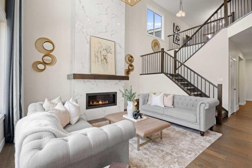 225 West Grove Way Sw, Calgary, AB - Indoor Photo Showing Living Room With Fireplace