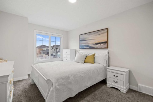 225 West Grove Way Sw, Calgary, AB - Indoor Photo Showing Bedroom