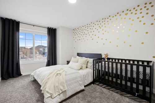 225 West Grove Way Sw, Calgary, AB - Indoor Photo Showing Bedroom