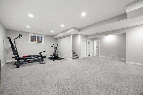 225 West Grove Way Sw, Calgary, AB - Indoor Photo Showing Gym Room