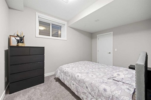 225 West Grove Way Sw, Calgary, AB - Indoor Photo Showing Bedroom