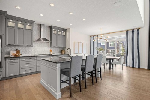 225 West Grove Way Sw, Calgary, AB - Indoor Photo Showing Kitchen With Upgraded Kitchen