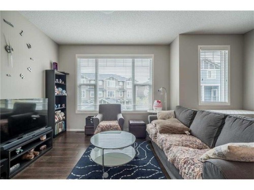538 Panatella Walk Nw, Calgary, AB - Indoor Photo Showing Living Room
