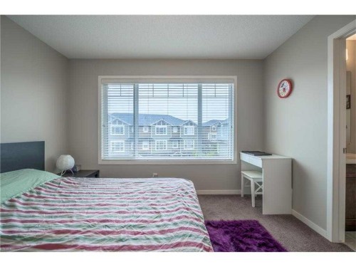 538 Panatella Walk Nw, Calgary, AB - Indoor Photo Showing Bedroom