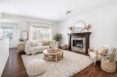 66 Sage Valley Manor Nw, Calgary, AB  - Indoor Photo Showing Living Room With Fireplace 