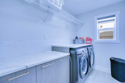 132 Belvedere Drive Se, Calgary, AB - Indoor Photo Showing Laundry Room