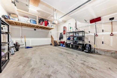 54 Seton Manor Se, Calgary, AB - Indoor Photo Showing Garage