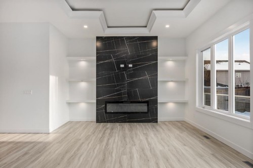 52 Lakes Estates Circle, Strathmore, AB - Indoor With Fireplace