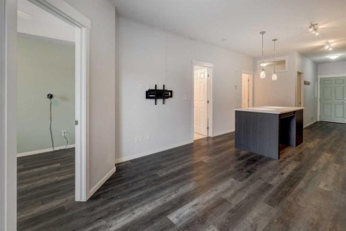 1105-298 Sage Meadows Park Nw, Calgary, AB - Indoor Photo Showing Living Room