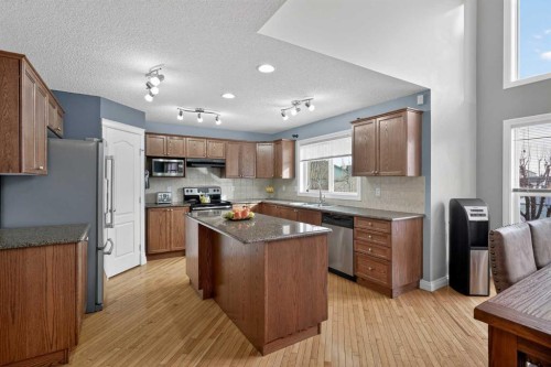 169 West Creek Boulevard, Chestermere, AB - Indoor Photo Showing Kitchen With Double Sink