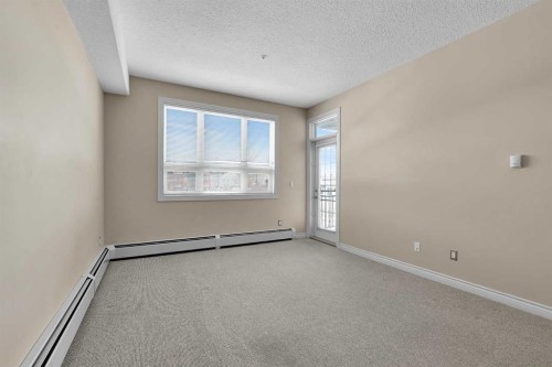 318-26 Val Gardena View Sw, Calgary, AB - Indoor Photo Showing Other Room