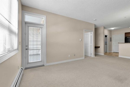 318-26 Val Gardena View Sw, Calgary, AB - Indoor Photo Showing Other Room